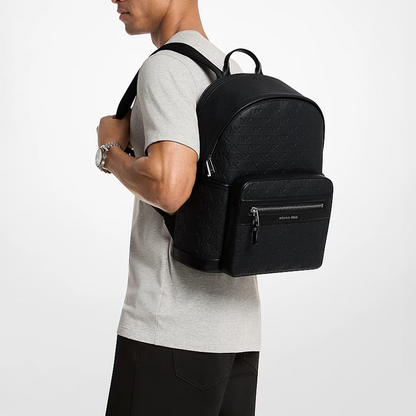 Jet Set Medium Logo Debossed Pebbled Leather Backpack